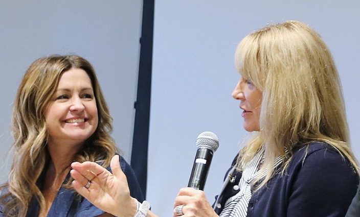 Linda Johansen-James speaking on a panel at SmartFem Summit in AZ, with Jen Devore Richter.